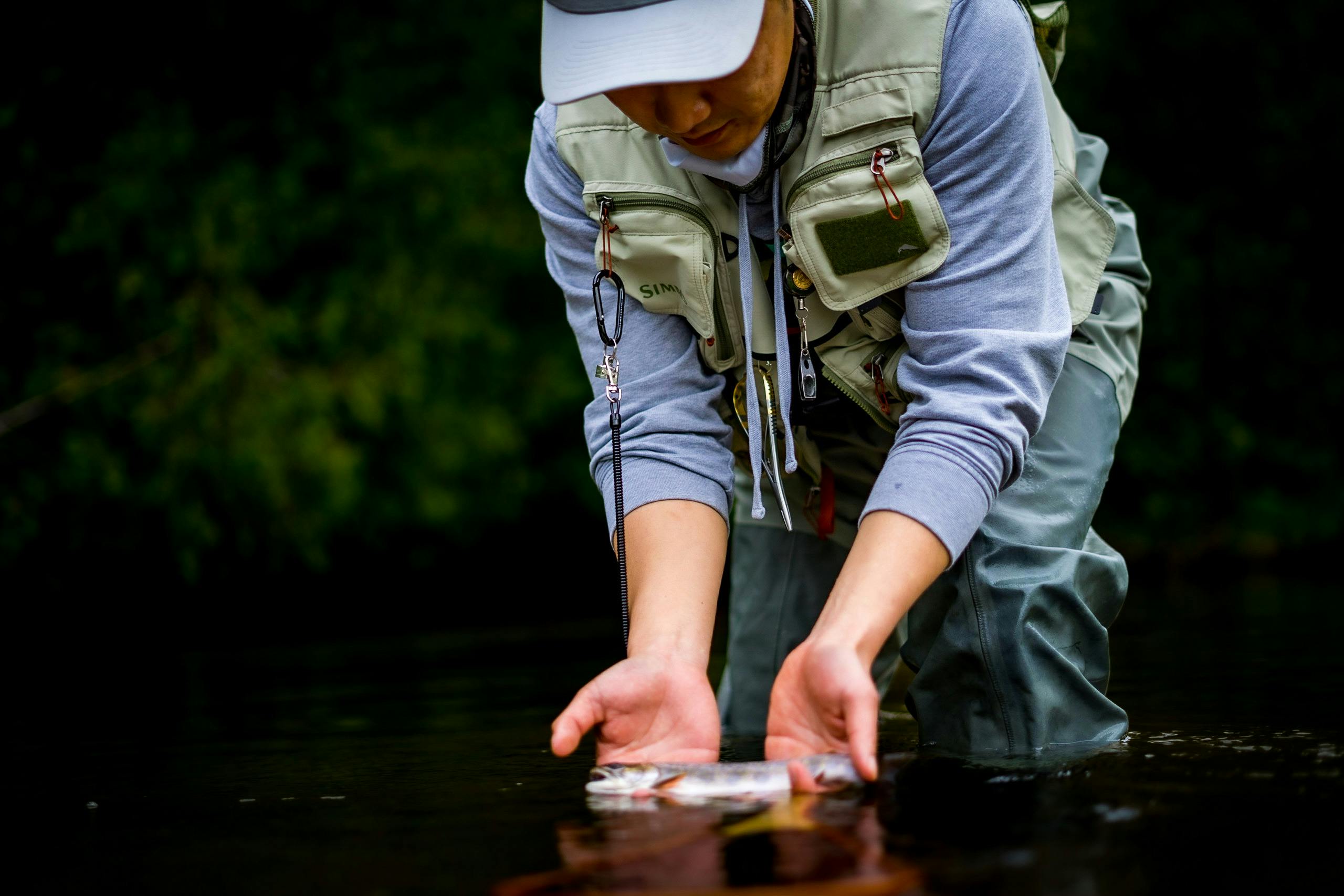 pexels-caleb-park-1635623739-28466734 man fishing in lake